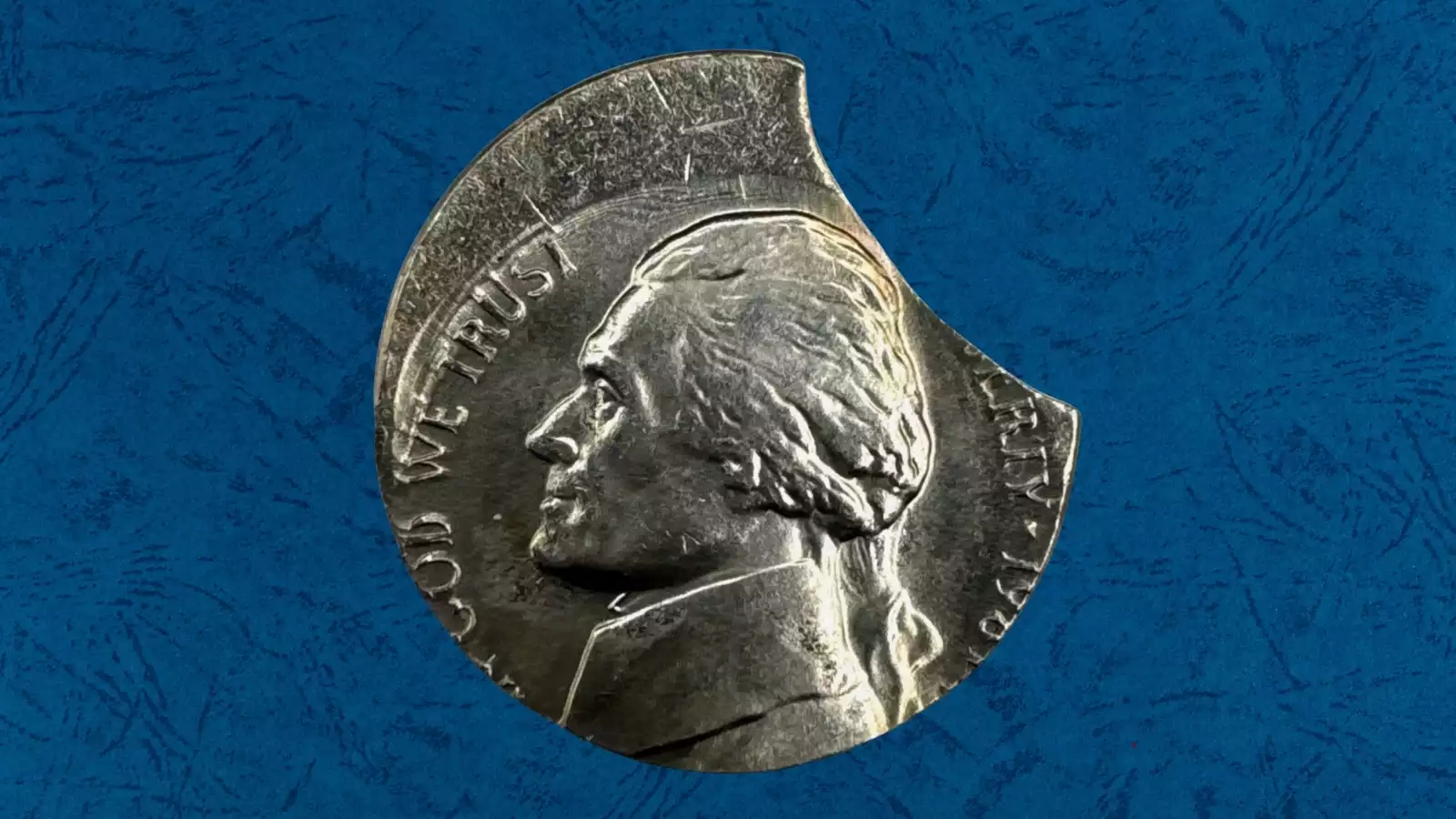 1981 Jefferson nickel clipped planchet error showing curved crescent-shaped missing section at coin edge
